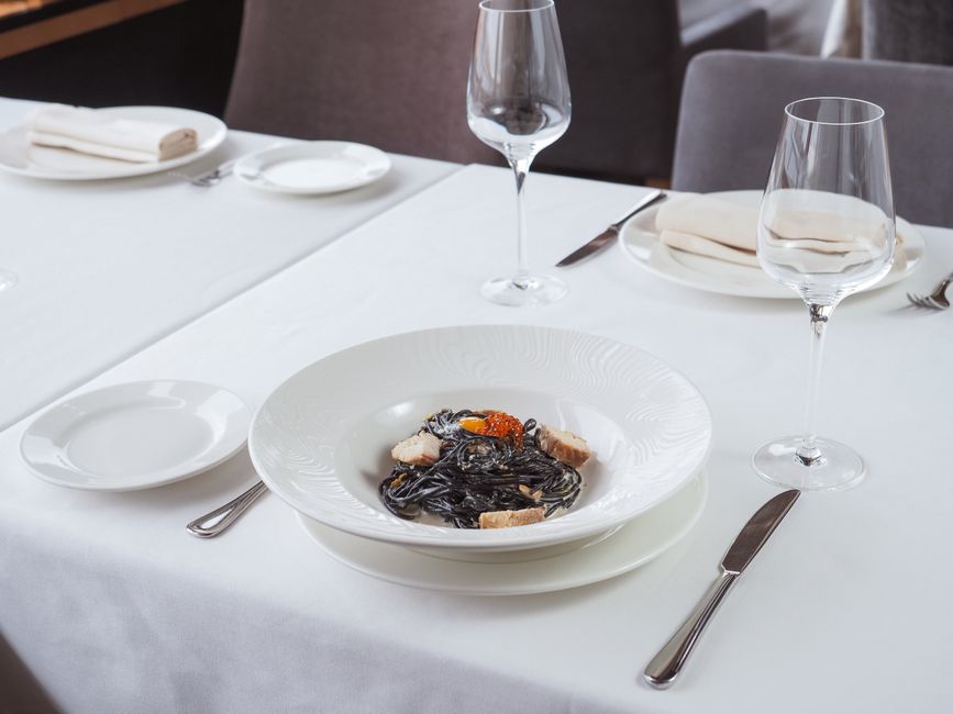 Exterior and dining ambience at Tutto